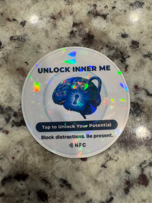 A round holographic NFC sticker. The sticker features a blue brain and padlock graphic with the text 'UNLOCK INNER ME', 'Tap to Unlock Your Potential', and 'NFC' printed at the bottom.